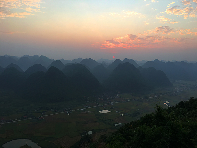 Sunrise views of Bac Son valley from Nà Lay peak, Vietnam