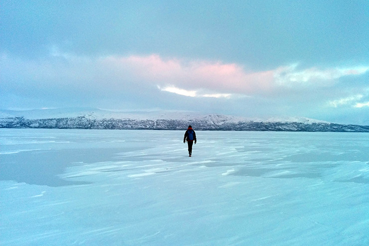 Walking on lake Torneträsk in Abisko
